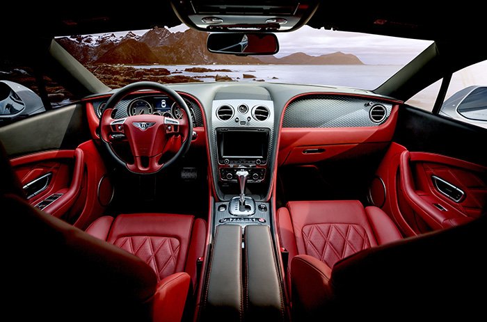 customised red car interior with red speakers